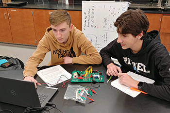 two male students in classroom